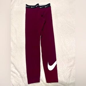 Nike woman’s burgundy  Leggings